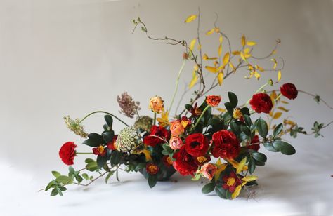 Yellow Red White Flower Arrangement, Red Yellow Green Flower Arrangements, Red Pink Yellow Flower Arrangement, Marigold Floral Installation, Burgundy And Yellow Floral Arrangements, Yellow Flower Arrangements, Wedding Cake Table Decorations, Cake Table Decorations, Wedding Cake Table