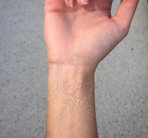 World map - white ink World Map Tattoo, Love Wrist Tattoo, Wörter Tattoos, World Map Tattoos, Meaningful Wrist Tattoos, Map Tattoo, Tattoo Wrist, Map Tattoos, White Ink Tattoo