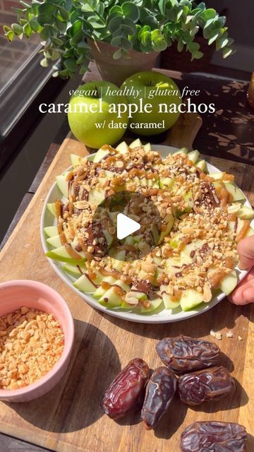 Peyton Pratte on Instagram: "Caramel Apple Nachos 🍎🍏 
The perfect fall snack or dessert! Recipe below. 
-
-

Ingredients:
3-4 green apples, thinly sliced 
1/3 cup chocolate chips 
1 tbsp coconut oil 
1/3 cup peanuts, crushed 
Date caramel:
8 medjool dated 
1/4 cup canned coconut milk (full fat) 
1/2 tsp salt 
1/3 cup maple syrup 

Instructions:
Soak the dates in water for 1 hour
Drain water and add the dates to a blender 
Add the canned coconut milk, salt, & maple syrup 
Blend until smooth 
Melt together the chocolate chips and coconut oil. I microwaved them for 30 seconds, stir, and repeat until smooth. 

Assemble the nachos. Add the apples, then chocolate, caramel, and crushed peanuts. So easy and fun! 
#applenachos #apples #appleseason #seasonalfood #eatwell #nourishing #nourish #nour Peyton Pratte, Caramel Apple Nachos, Gluten Free Caramel Apples, Apple Nachos, Date Caramel, Dessert Hacks, Fall Snacks, Apple Season, Green Apples