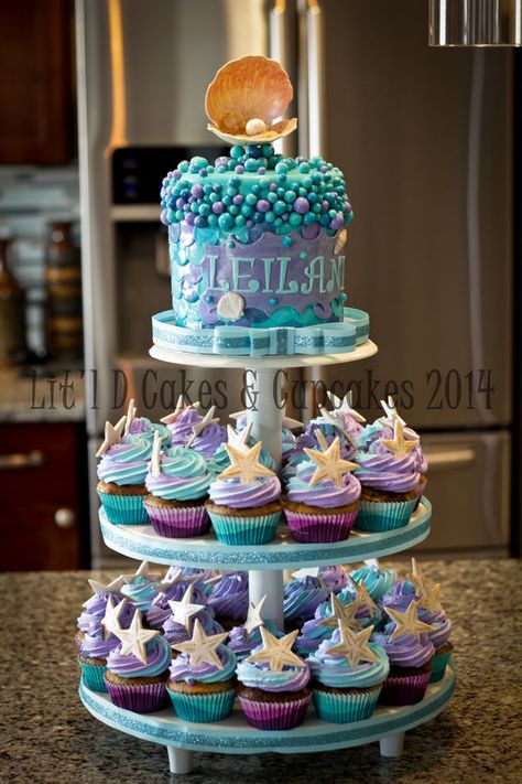 Purple and Aqua Baby Shower - cupcake tier idea, also Under the Sea themed.... just love the colors though! Sea Cupcakes, 4de Verjaardag, Ideas Fiesta, Ariel Birthday, Sea Baby Shower, Mermaid Theme Party, Sea Birthday Party, Mermaid Baby Showers, Mermaid Parties