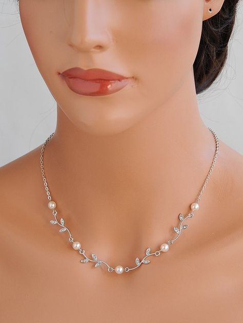 "Original Design by Glamorous Bijoux® This listing is for the KACEY Necklace - Please choose from one of the following options: 16\" Necklace without backdrop 18\" Necklace without backdrop 20\" Necklace without backdrop 16\" Necklace w/ backdrop 18\" Necklace w/ backdrop 20\" Necklace w/ backdrop Beautiful bridal necklace features dainty vintage style leaf vine filigree. Carefully encrusted with tiny rhinestones and embellished with hand-wrapped Swarovski pearls. Finished off with an extender a Jewelry For Sweetheart Neckline Wedding, Wedding Necklaces For Bride, Bride Necklace Wedding, Leaf Filigree, Prom Necklace, Bride Necklace, Pearl Bridal Jewelry, Pearl Necklace Wedding, Back Drop