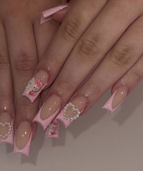 Valentine’s Day Nail Ideas Pink, Hello Kitty Nails Valentines, Hello Kitty Valentine’s Day Nails, Acrylic Nail Designs Charms, Hello Kitty Valentine Nails, Valentines Day Nails Hello Kitty, Hello Kitty Valentines Nails, Almond Shaped Valentines Day Nails, Pink Valentines Day Nails Short