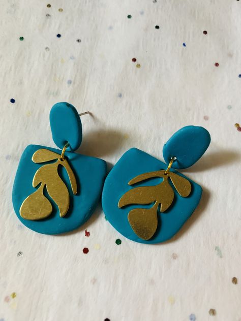 Beautiful Turquoise handmade clay statement earrings with brass floral charm Turquoise Statement Earrings, Statement Earring, Handmade Clay, Statement Earrings, Sugar Cookie, Polymer Clay, Turquoise, Brass, Floral