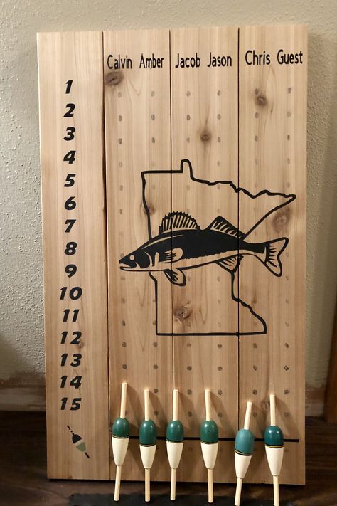 Ice Castle Decor fish count board Cedar Fish House Decor Ideas, Fishing Brag Board Diy, Ice Castle Fish House Organization, Fish House Storage Ideas, Ice Castle Fish House Ideas, Ice Fishing Shack Ideas, Fishing Brag Board, Ice Fishing Decor, Fish House Ideas