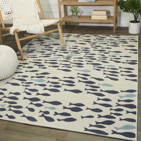 Complement your coastal decor with this Mod-Tod area rug. The plush polypropylene pile is detailed with a fish pattern for nautical charm. Stain-resistant and non-shedding, the durable carpet is ideal for busy living areas or kid's playrooms. Coastal Area Rug, Coastal Area Rugs, Rug Cream, School Of Fish, Durable Carpet, Target Rug, Navy Blue Area Rug, Blue Area Rug, Blue Area