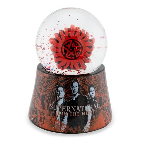 Shake up your fandom with this collectible Supernatural snow globe! Featuring the Anit-Possession Symboln, this fun snow glove measures approximately 2.75-inches tall - the perfect size for your office desk, home bookshelf and so much more! Officially licensed snow globe. Produced by Silver Buffalo, a trendsetting housewares and home decor company based in the heart of New York City. A Toynk exclusive! Supernatural Accessories, Supernatural Anti Possession, Goth Apartment, Home Bookshelf, Home Bookshelves, Office Desk Home, Jared Padalecki Supernatural, Pink Goth, Nick Nacks