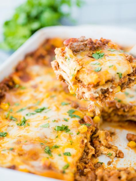 Tex Mex Lasagna - this casserole dish turns your traditional lasagna into a Tex Mex dish with the Mexican flavors you love. While still using pasta noodles, we add in beef, beans, corn, and your favorite spices like cumin and chili powder. Mexican Lasagna With Noodles, Tex Mex Lasagna Recipe, Lasagna With Noodles, Tex Mex Lasagna, Beef Taco Seasoning, Mexican Lasagna Recipes, Chinese Soup Recipes, Mexican Flavors, Mexican Lasagna