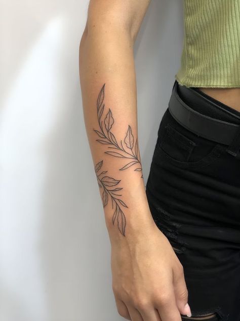 Forearm Leaf Tattoo Women, Small Wrist Wrap Tattoos, Vine Up The Arm Tattoo, Vines Around Words Tattoo, Botanical Forearm Tattoo Women, Leaf Tattoo Arm Wrap, Vine Around Forearm Tattoo, Double Knee Tattoos Women, Leaf Wrap Around Tattoo Forearm