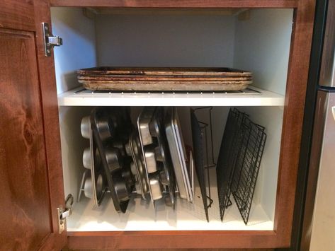 10 Ways to Organize Baking Pans • Organization Junkie Baking Pans Organization, Above Refrigerator, Baking Organization, Baking Cupboard, Lasagna Pan, Pan Organization, Pan Rack, Ways To Organize, Mid Century Modern Kitchen