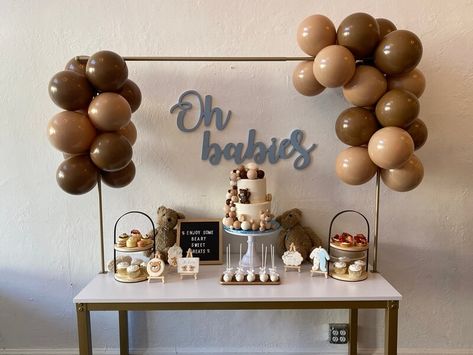 Throw a super cute bear-themed birthday party for your twins and decorate an adorable dessert table for a delightful display of sweet treats. Position an over-the-table gold stand and embellish it with chocolate-colored balloons to perfectly complete the theme while also highlighting your unique dessert display. Arrange cake stands, cupcake stands, and serving trays on the table and enhance the adorability of your setup with mini easel stands displaying cute accents. Chocolate Themed Birthday Party Decorations, Cupcake Setup Display, Book Themed Birthday Party, Party Buffet Table, Event Decor Ideas, Party Decorations Table, Vendor Table, Mini Easel, Cupcake Stands