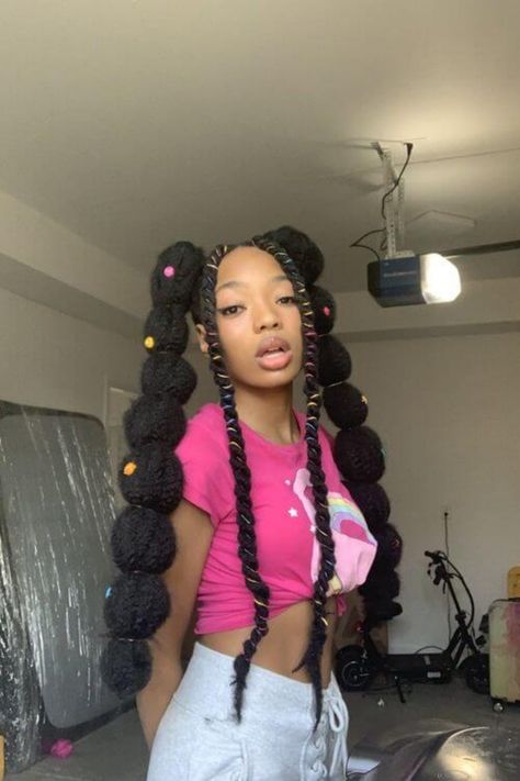 Let me introduce you to the flawless bubble braid if you adore the way braids appear but feel you lack the necessary… Black Pigtail Braids, Colorful Black Hairstyles, Bubble Braids On Natural Hair, Puff Braid Hairstyles, Juneteenth Hairstyles, Bubble Braids Black Women, Unique Hairstyles For Black Women, Black Female Hairstyles, Cute Black Hairstyles