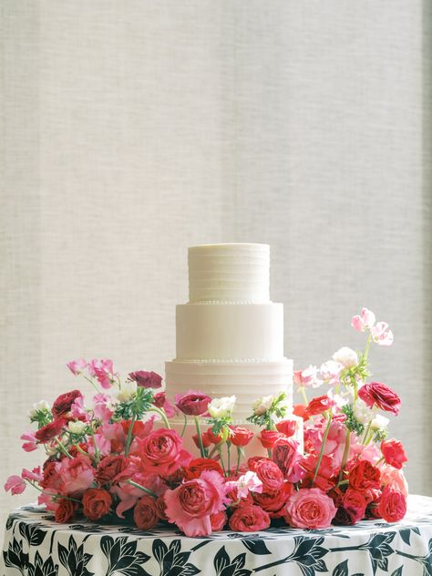 Classic white wedding cake with printed mod tablecloth and pink floral meadow at the Austin Proper Hotel Cake Meadow, Wedding Cake Simple Buttercream, Austin Proper Hotel, Outdoor Wedding Cake, Proper Hotel, Photography Minimal, Classic White Wedding, Floral Meadow, Wedding Bubbles