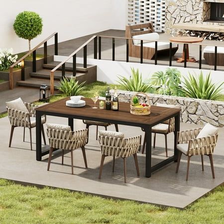 Embrace the beauty of outdoor living with this outdoor dining table, a stylish and functional centerpiece that's perfect for any patio or garden setting. The inviting, wood-textured tabletop, made of robust Wood Plastic Composite (WPC), is engineered for durability and longevity, resisting UV rays and water, which means your investment continues to pay off, season after season. Beneath the elegant surface, a solid and sturdy frame featuring 1.97-inch thick table legs provides a stable foundation Pool Backyard, Boho Patio, Patio Pool, Outdoor Patio Table, Wood Plastic Composite, Stables Design, Patio Dining Table, Teak Outdoor, Backyard Makeover