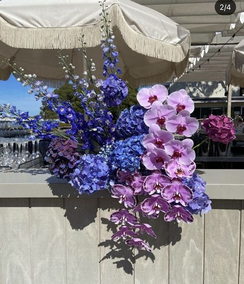 Blue Purple Floral Arrangement, Pink Purple Blue Wedding Flowers, Blue Purple Flowers Arrangement, Blue And Purple Wedding Florals, Galaxy Floral Arrangements, Starry Night Wedding Flowers, Purple Blue Flower Arrangements, Purple And Blue Flower Bouquet, Purple And Blue Flower Arrangements