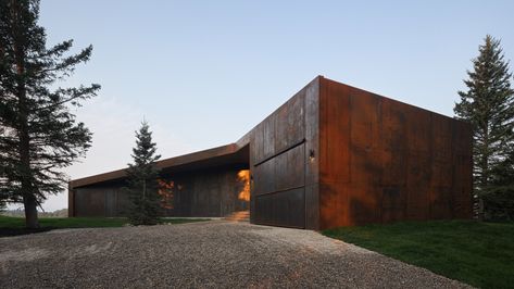 Saunders Architecture creates steel-clad house for Carraig Ridge in Alberta Clad Home, Saltbox Houses, Exterior Finishes, Native Gardens, Stone Granite, Arch House, Front Fence, Weathering Steel, Light Colored Wood