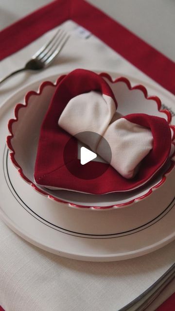 Loui Burke on Instagram: "How to fold a heart shape napkin ♥️ 
1.Lay your napkin flat in a diamond shape.
2.Fold in half to make a triangle
3. Take each side and fold into the middle
4. Fold the sides again to meet the middle
5. Flip the napkin around to the other side
6. Roll from the base three times
7. Flip the napkin back around
8. Pull the upper corners around to create a heart shape
Done! 

Be sure to save and share with a friend who loves to host dinner parties 🫶✨ #napkinfold#heartshape#valentinesday" Host Dinner Party, How To Fold, Napkin Folding, Dinner Parties, Diamond Shape, The Other Side, A Heart, Heart Shape, Diamond Shapes