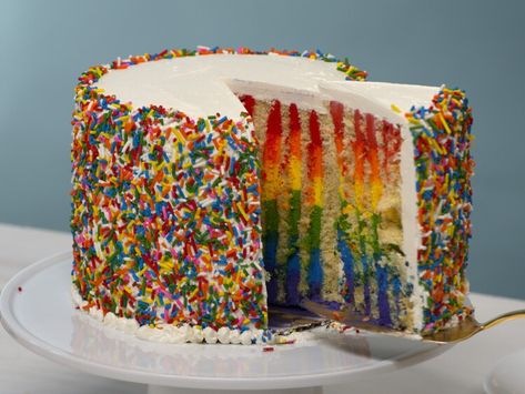 5 Rainbow-Colored Treats That'll Make Your Day So Much Brighter — Food Network Confectioners Sugar Frosting, Vertical Cake, Rainbow Sprinkle Cake, Rainbow Sprinkle, Dry Measuring Cups, Cake Piping, Sugar Frosting, White Frosting, Sprinkle Cake