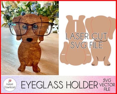 Craft stylish eyeglass holders and stands using wood and laser cut designs that keep your eyewear organized in style! Wooden Glasses Holder, Eyeglass Display, Eyeglass Stand, Wood Yard Art, Glasses Stand, Dog With Glasses, Eyeglass Accessories, Laser Cut Wood Crafts, Laser Engraved Ideas