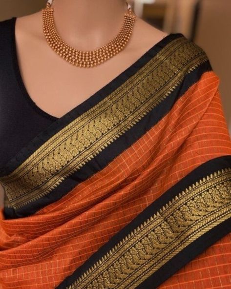 💗 ORANGE COLOR COTTON SILK SAREE WITH GOLD ZARI BORDER COME WITH BLOUSE      💗  D.NO KUM-13000      ✅ Saree:  Orange silk cotton checks saree with black zari border  saree.. comes with                       contrast Black pallu and blouse.                      Light and Comfortable to WEAR |    Solid and No Transparent |  South Indian Style                                                      Saree checks warp lines are ZARI and weft lines are GOLDEN thread.     ✅ COMPLIMENTARY Fall and Edging (Pico): Saree comes with Complimentary Fall & Pico. No need to run around to get the Fall or Pico - it is free and done already! 💗 We Regularly Update our Shop with New Listings and update our old listings daily. You can LIKE and FAVORITE our Shop to stay updated. Find more listings in my shop her South Indian Style Saree, South Indian Saree, Indian Saree Wedding, Simple Saree Designs, Checks Saree, Mysore Silk Saree, Orange Saree, Cotton Saree Designs, South Indian Sarees