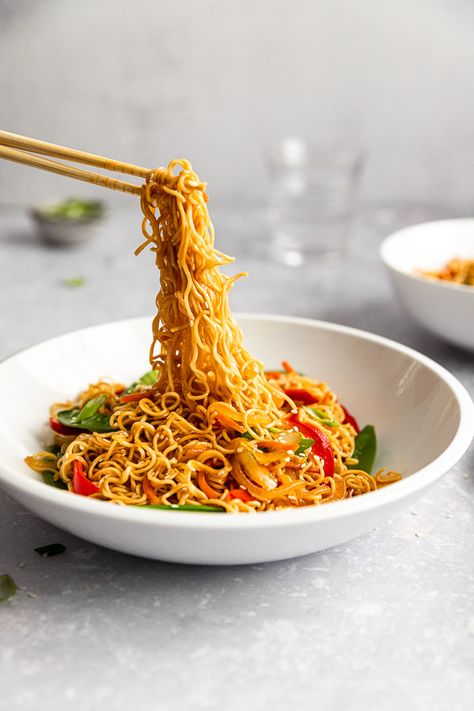 In just under 30 minutes you can have better-than-take-out Vegetable Lo Mein! Make this quick and easy recipe right in your kitchen, with its savory sauce, veggies, and soft, chewy noodles. It's a recipe made for two, but you're going to want to make a double batch once you take a bite! Noodles Wallpaper, Lo Main, Lo Mein Sauce, Veggie Lo Mein, Chewy Noodles, Forever Wallpaper, Maggi Noodles, Vegetable Lo Mein, Maggi Recipes