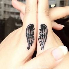 Over the past decade, angel wings have skyrocketed in popularity within the tattoo world. We've seen wings on fingers, arms, necks, and, of course, draped all Tiny Finger Tattoos, Cute Finger Tattoos, Finger Tattoo For Women, Matching Sister Tattoos, Kunst Tattoos, Finger Tattoo Designs, Bff Tattoos, Friendship Tattoos, Celtic Tattoos