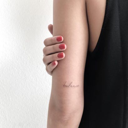 Above-the-elbow tattoos: 20 Ideas we want to get Inner Elbow Word Tattoo, Word Tattoo Above Elbow, Tattoo Behind Arm Above Elbow Quotes, Top Of Elbow Tattoo Women, Outside Elbow Tattoos For Women, Minimalist Elbow Tattoos For Women, Elbow Word Tattoo, Tattoo Ideas Behind Elbow, Tattoo For Elbow Women