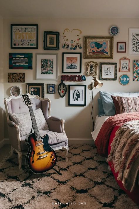 Cozy bedroom with a vintage armchair, electric guitar, and an eclectic gallery wall. Music Inspired Bedroom, Rock Bedroom, Dorm Room Aesthetic, Music Themed Rooms, Music Themed Bedroom, Chalkboard Wallpaper, Music Themed Decor, Unique Bedside Tables, Shed Tiny House