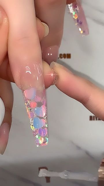 Riya's Nails 🇰🇭 on Instagram: "✨💕 Everything Aurora 🦄💕 #ʀɪʏᴀɢᴇʟᴘᴏʟɪꜱʜ “031+ 112” ✨Seashell sticker sheet ✨Aroura hearts ✨Reflective Holo 02 ✨Aroura Mylar 01 #riyanowipeglossytopcoat✔️ 🛍SHOP (Link in bio ) or visit 𝐑𝐢𝐲𝐚𝐬𝐍𝐚𝐢𝐥𝐬.𝐜𝐨𝐦 Tag @shopriyaproducts for more chance to be feature 🙏🏼 #𝐑𝐢𝐲𝐚𝐩𝐫𝐨𝐝𝐮𝐜𝐭𝐬 #𝐑𝐢𝐲𝐚𝐠𝐞𝐥𝐩𝐨��𝐥𝐢𝐬𝐡 ✨ 📍#riyasnailsalon ✨ #Nailpro#nailsofinstagram #nailart #makeuptutorial #fashion #behindthe#nailideas #naildesigns #longnails #acrylicnails# Mylar Nails, Reflective Nails, Shiva Painting, Nail Swag, Lord Shiva Painting, Coffin Nails Designs, Nail Pro, Nail Art Inspiration, Nails Designs