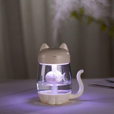 Like and Share if you want this 3-in-1 Cat & Fish Ultrasonic LED Humidifier – USB Aroma Diffuser with Timer Tag a friend who would love this! FAST US Shipping Buy one here ——> https://prehype.shop/3-in-1-cat-fish-ultrasonic-led-humidifier-usb-aroma-diffuser-with-timer/ #musthave #shopnow Cute Humidifier, Cat Related Gifts, Bedroom Gadgets, Cat Lead, Portable Air Purifier, Air Fan, Desk Fan, Rose Essential Oil, Cat Air