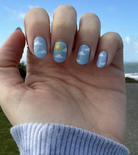 Baby blue nails with clouds and sun Cute Cloud Nail Art, Sun And Cloud Nails, Blue Cloud Nail Designs, Blue Nails Clouds, Blue Nails With Clouds, Nail Art Clouds, Blue Cloud Nails, Sun Nails Design, Nails With Clouds