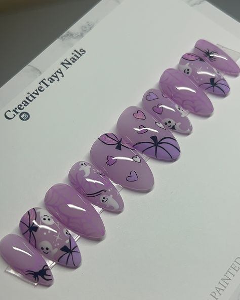 Lilac spooky nails💜🎃🕸️💅🏻 this is part 2 of my customers order on her fav shape, medium almond. The original inspo was all in pink but she wanted to change it to purple tones and I’m even more obsessed with this version! DM to get your very own Halloween nails delivered to you🫶🏻 Products used: @apresnailofficial medium almond, @dndgel DC 118, 247, @beetlesgelpolish @beetles_community d892, @by.chloenails glossy top coat #halloweennails #spookynails #pressonnailset #ghostnails #pumpkinnails... Lilac Halloween Nails, Gray And Purple Nails, Purple Nails Halloween, Purple Spooky Nails, Purple Beetle, Tones And I, Spooky Nails, Cute Halloween Nails, Medium Almond