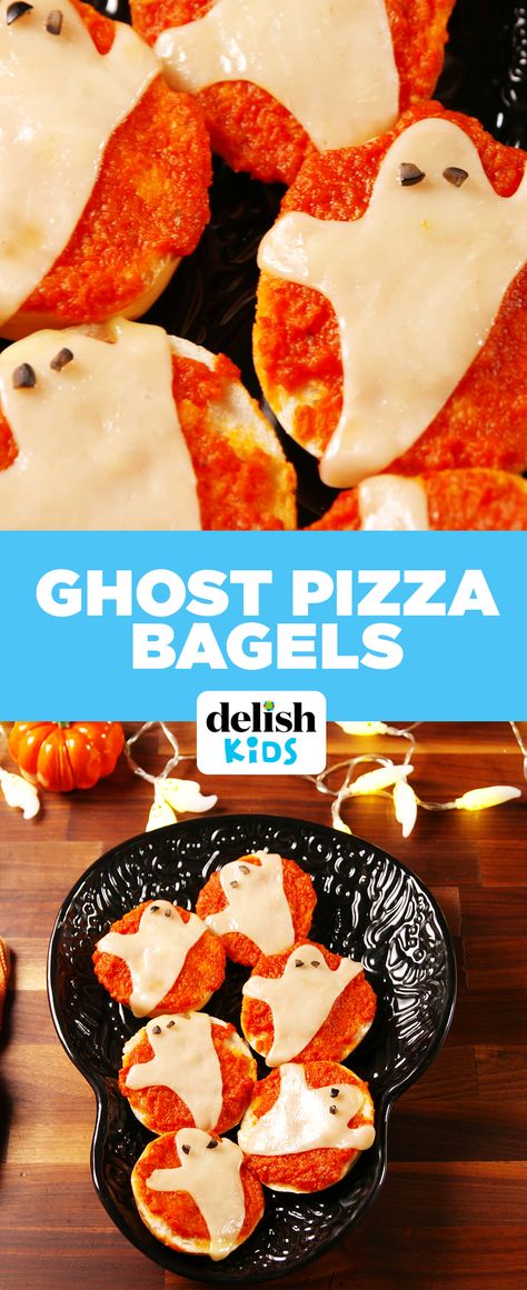 Ghost Pizza Bagels are the scary-easy dinner your kids need. Get the recipe at Delish.com. Pizza Ghost, Ghost Pizza, Halloween Wednesday, Spooky Dinner, Halloween Pizza, Halloween Foods, Themed Treats, Pizza Bagels, Halloween Sweets