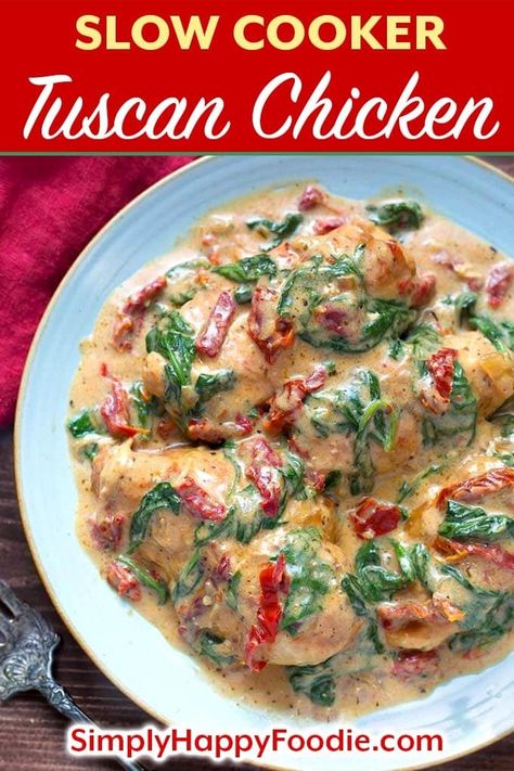 Slow Cooker Creamy Tuscan Chicken recipe is a simple meal to make. With tender chicken breasts, sun dried tomatoes, and a creamy Alfredo sauce, this crock pot tuscan chicken recipe is a delicious meal. slow cooker Tuscan chicken recipe, crock pot Tuscan chicken breasts recipe by simplyhappyfoodie.com #slowcookercreamytuscanchicken #slowcookerchickenbreasts #crockpottuscanchicken #crockpotchicken Slow Cooker Creamy Tuscan Chicken, Crockpot Tuscan Chicken Recipes, Tuscan Chicken Pasta Crockpot, Tuscan Chicken Crockpot, Crockpot Tuscan Chicken, Slow Cooker Tuscan Chicken, Crock Pot Tuscan Chicken, Creamy Tuscan Chicken Recipe, Tuscan Chicken Recipe