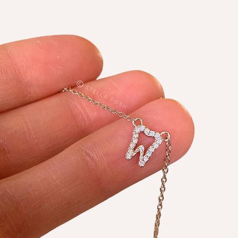 This tiny tooth necklace is the perfect Dental Hygienist gift, Dental Assistant gift, or gift for Dentist! Made with quality hypoallergenic .925 Sterling Silver, and suitable for sensitive skin. The tooth charm is dainty and delicate, and perfect to layer and stack with other necklaces. This adorable tooth charm is adorned with tiny zircons and built into the chain in a barely there, minimalist style. Necklace is adjustable, so she'll find her perfect length.  Gift-ready packaging (as-shown) is Gifts For Hygienist, Dentist Assistant, Dental Jewelry, Gift For Dentist, Dental Assistant Gifts, Dental Aesthetics, Dental Hygienist Gifts, Tooth Charm, Dental Gifts