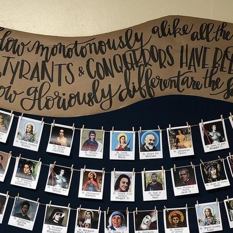 Katie Bogner on Instagram: "(Read on for a blog-length-description:😉) I finished this bulletin board a couple of days ago but it still needed a title, so like a modern teacher 👩🏼‍🏫 I asked in Instastories for ideas. You guys had some brilliant suggestions! But... I ended up not using any of them. 😂 This display has a little image for each of my 8th graders with their (future) Confirmation Saint🔥- I wanted a way to help me remember who they had chosen and to work them into lessons and conversations, and also to remind the kids to be asking for the Saints’ prayers, 🙏🏻 so setting this up seemed like a great idea. I got the list, found pics, typed it all up, printed, cut... and then realized that with the white borders they unintentionally looked like polaroids. 🤦🏼‍♀️ (swipe to see c Catholic Bulletin Boards, Saints Prayers, Modern Teacher, In His Image, Jack G, Catholic Kids, The Saints, Catholic School, Cs Lewis