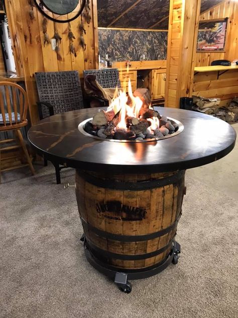 This is an authentic Jack Daniels whiskey barrel reinvented into a beautifully unique fire pit.  This fire pit has a high performance custom concrete table top and can be set up for hookup to a propane tank or natural gas.  The burner and burner pan are made of high grade 314 stainless steel.  The concrete top can be customized for each individual customer's preferences. Wine Barrel Fire Pit, Barrel Fire Pit, Concrete Tables, Taman Air, Barrel Projects, Wine Barrel Furniture, Barrel Decor, Bar Tops, Barrel Table