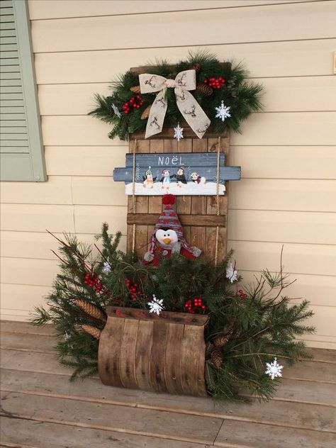 50+ Rustic Farmhouse Christmas Front Porch Decor Ideas - Hike n Dip Christmas Toboggan Decoration, Tobaggon Christmas Decor, Toboggan Sled Decor, Tobaggan Decor, Farmhouse Christmas Front Porch, Front Porch Decoration Ideas, Christmas Front Porch Decor Ideas, Christmas Sleighs, Sleigh Decor