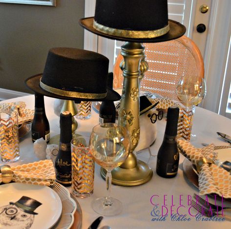 A formal tablescape for New Year's Eve, black and gold with top hats and a whimsical owl!  #newyearseve #newyearsevedinner #newyearsevetablescape #owltablescape Center Piece For Men’s Party, Elegant Gold Top Hat For Party, Themed Black Top Hat For Party, Fitted Black Top Hat For Themed Events, Top Hat Centerpieces Table Decorations, Black And Gold Masculine Party, Reunion Centerpieces, New Years Eve Dinner, Dinner Party Decorations