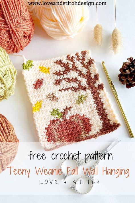 I am so excited to introduce The "Teeny Weanie" Fall Wall Hanging crochet pattern! This would make the perfect addition to your last minute market prep. It would also be the perfect decor or lockers and dorms! #crochet #crochetdesign #crochetaddict #crochetando #crochetdecor #crocheted #crochetersofinstagram #crocheter #freecrochetpattern Fall Garden Crafts, Wall Hanging Crochet Pattern, Crochet Pillow Covers Free Pattern, Fall Tapestry Crochet, Crochet Christmas Wall Hangings, Mosaic Tapestry, Crochet Banner, Crochet Thanksgiving, Fall Wall Hanging