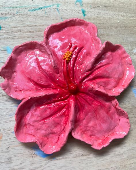 Baby booties & clay hibiscus flower I made!! 🌺❤️🖌️ Hibiscus Air Dry Clay, Hibiscus Flower Jewelry Holder, Hibiscus Jewelry Holder, Hibiscus Flower Clay Tray, Flowers Out Of Clay, Clay Art Flowers, Hibiscus Clay Tray, Clay Hibiscus Flower, Clay Ideas Flower