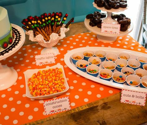 Cars, Planes and Choo Choo Trains! Donut Spare Tire, Planes Trains And Automobiles Party Food, Cars Birthday Party Food, Tire Cake, Spare Tires, Cars Birthday Party, Planes Birthday, Transportation Birthday, Dessert Table Backdrop