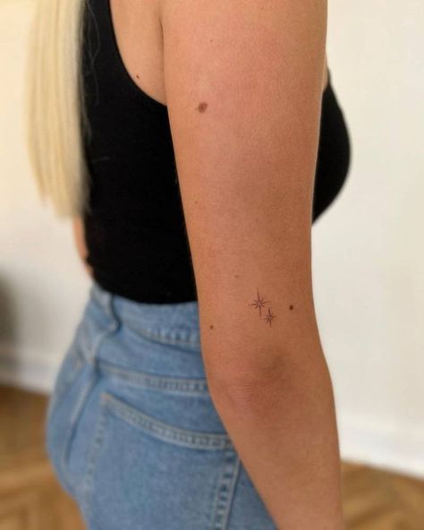 Tiny Stars Tattoo Arm, Sticker Sleeve Minimalist, Tattoo Right Above Inner Elbow, Back Star Tattoos For Women, Upper Back Fine Line Tattoo, Dainty Tattoo Above Elbow, Dainty North Star Tattoo, Back Of Arm Star Tattoo, Mini Star Tattoo Simple