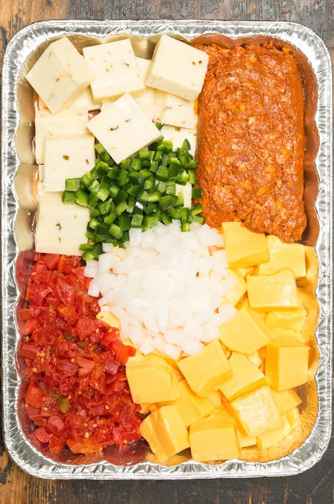 Smoked queso has been going viral all summer for a reason - it's one of the most delicious, cheesy recipes you can make in the smoker! Velveeta cheese, pepper jack, tomatoes, peppers, onions, pork chorizo, and more make this a tasty dip! #cheese #queso #appetizers Smoked Queso With Chorizo, Smoked Queso Dip With Chorizo, Smoker Queso Recipe, Smoked Queso Dip On Smoker With Chorizo, Smoked Chorizo Queso Dip, Smoked Peppers In Smoker, Smoked Cheese Dip In Smoker, Smoker Queso, Smoked Queso Dip On Smoker