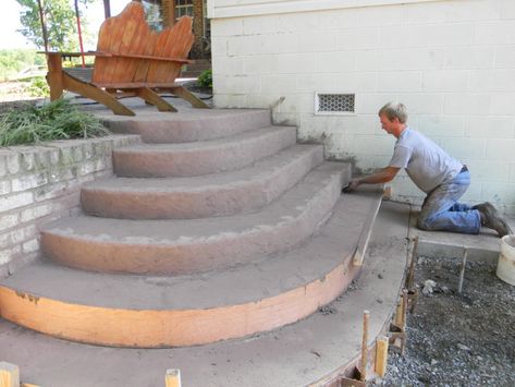 With a second color of dye powder in a mold release, the steps were pounded with a stamp to make a random stone-like pattern. Description from homejoys.blogspot.ca. I searched for this on bing.com/images Curved Concrete Steps, Curved Patio Steps, How To Pour Concrete Steps, Curved Front Steps, Backdoor Steps To Patio, Stamped Concrete Steps, Curved Steps, Concrete Front Steps, Concrete Porch Steps