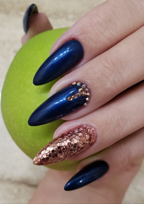 Navy blue with rose gold accent Dark Blue And Rose Gold Nails, Blue And Bronze Nails, Rose Gold And Blue Nails, Navy And Copper Nails, Navy Blue And Rose Gold Nails, Blue And Rose Gold Nails, Nails Acrylic Rose, Navy And Rose Gold Nails, Gold Nails Acrylic