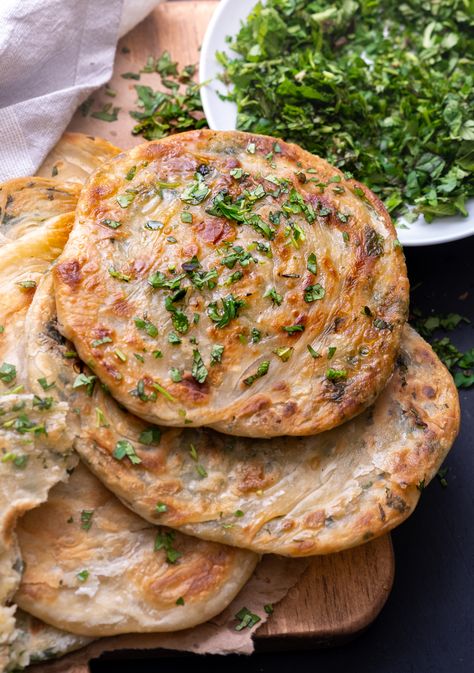 Herbed Olive Oil Parathas (Flaky Indian Flatbread) - Wandering Chickpea Infused Olive Oil Recipes, Wandering Chickpea, Paratha Bread, Olive Oil Pizza, Herb Infused Olive Oil, Indian Flatbread, Indian Flat Bread, Olive Oil Recipes, Herb Bread