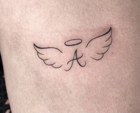 A With Angel Wings Tattoo, Small Angel Wing Memorial Tattoo, Angel Wings Tattoo With Letter, Angel Tattoo With Letter, Letter A With Wings Tattoo, Angel Small Tattoo For Women, Forever 15 Tattoo, Angel Wings Wrist Tattoo For Women, Angel Tattoo With Initials