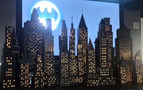 Gotham city made out of boxes hot glue parchment paper outdoor lights and spray paint Gotham City Halloween Decorations, Gotham City Decorations, Gotham City Party, Party City Decorations, Annie Jr, New York Dance, Batman Decor, Batman Halloween, Building Silhouette