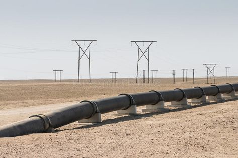 Pipeline in the desert. Oi, gas or water pipeline and electricity pylons in the , #Sponsored, #water, #pipeline, #electricity, #gas, #Pipeline #ad Pipeline Construction, Water Pipeline, Namib Desert, Space Planets, Water Pipes, Geometric Design, Energy, Electricity, Stock Images