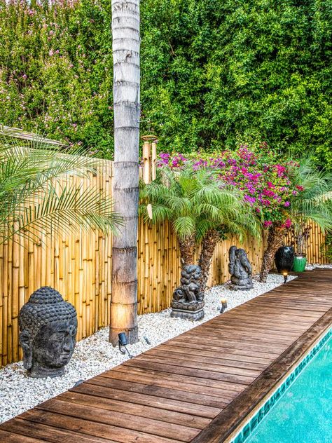 Bali Backyard, Pool Area Decorating Ideas, Wood Pool Deck, Tropical Outdoor Decor, Around House Landscaping, Rocks Around House, Backyard Spa, Bali Style Home, Bali Garden